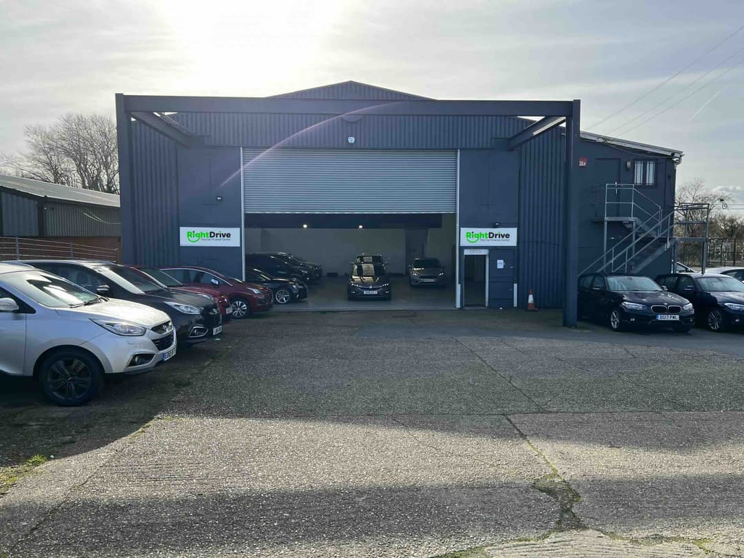 The RightDrive Car Finance Centre showroom with used cars parked across the forecourt